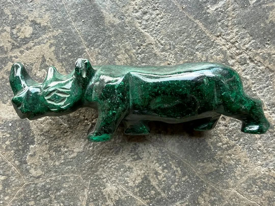 Green Rhinoceros Figurine Pair - photo 1